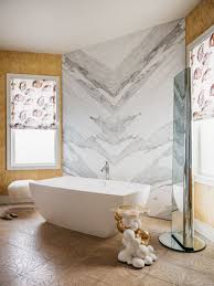 This bathroom by if walls could talk features a a beautiful glass shower with marble tiles. Pamper Yourself How To Transform Your Luxury Bathroom Design