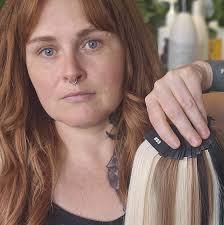 After invisible tape weft extensions. (I'm not a business owner) Are tape  wefts reusable? How long between move ups ? Thanks