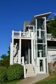 creating an accessible world experiences in elevated ability house elevation house exterior house lift