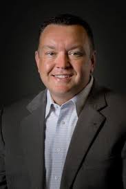 Mark E. Denman Joins Genesis Financial Solutions as President of Genesis  Credit