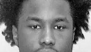 1 charged, 1 sought in assault/robbery