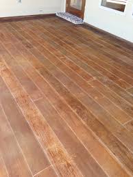 How To Paint Concrete To Look Like Wood Concrete Stained Floors Painted Concrete Floors Paint Concrete Patio