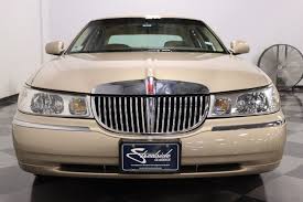 Image result for Medium Gold 1998 Town Car