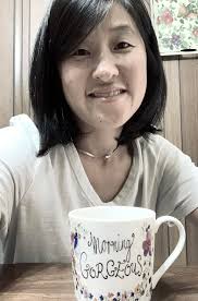 Enjoying a homemade cappuccino in a vintage mug