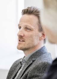 Spencer John Director at