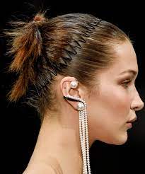 We all remember those scrunchies. 90s Hair Accessories Make A Comeback At Fashion Week