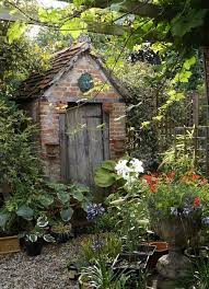Garden Shed Hostas Arbor Flowers Even A Greenman Above The Door Pretty Much Perfect Cottage Garden Sheds Cottage Garden English Cottage Garden