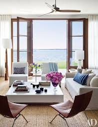 21 Living Rooms That Do Beach Inspired Decor Right Beach Living Room Beach House Living Room Living Room Modern