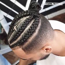 For each section, style a bun on top of the head. Man Bun Braids A Surprising New Men S Hair Trend To Try In 2021