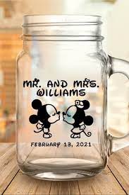 25 Adorable Disney Themed Wedding Favors That Your Guests Can Actually Use Disney Wedding Theme Themed Wedding Favors Mason Jar Wedding Favors