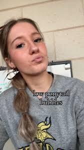 Softball Hairstyles for Each Base A Braid into Two Ponytails