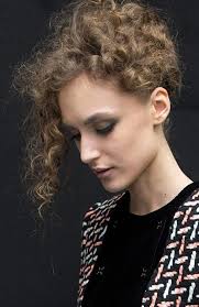 Tousle your hair and then use a round brush to gather the top of your hair in whatever direction you wish to angle it. 30 Easy Hairstyles For Short Curly Hair The Trend Spotter