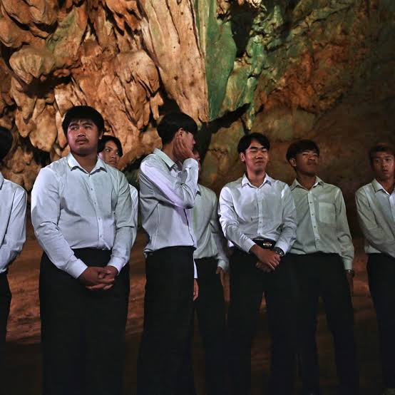 British diver and Thai youth athlete he rescued from cave in 2018 reunite | Thailand cave rescue | The Guardian