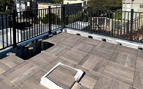 Installing deck tiles can completely change the look of a garden. Roof Pavers How To Build Elevated Roof Decks With Archatrak Pavers