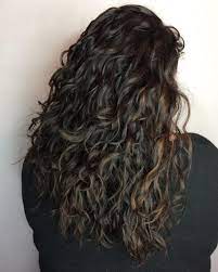 Roche recommends a cut with long layers for girls who have newly embraced their curly locks and booked their first curly haircut. Long Curly Haircut Ideas Novocom Top
