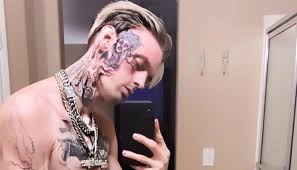 Much of his skin, including his famous. Post Malone Debuts Brutal New Face Tattoo Closing Year Of Weird And Wonderful Celebrity Ink Newshub