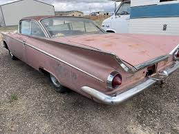 Image result for Tawny Rose 1959 Buick