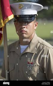 A U.S. Marine Corps recruit with Hotel Company, 2nd Recruit Training  Battalion, practices snapping in techniques during grass week