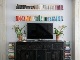 Floating wall mount console tv media shelf dvd cable sky box tidy storage holder. 12 Ways To Decorate With Floating Shelves Hgtv S Decorating Design Blog Hgtv