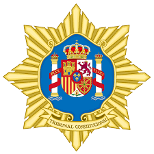 The constitutional court considered a case whereby the election commission submitted a petition to the constitutional court for a ruling to dissolve the future forward party. File Spanish Constitutional Court Magistrate Badge Svg Wikimedia Commons