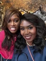 Sisters enjoying waterfront festivities together