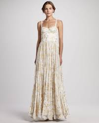 Metallic dresses glitter, shimmer & shine in champagne to rose blush shades, as long gowns and short dresses. 15 Sparkly Dresses For Wedding Guests