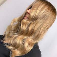 The overall effect is not quite blonde, but rather a glowing light brown color with lightness on the ends of the front strands of hair. Caramel Blonde Hair Ideas And Formulas Wella Professionals