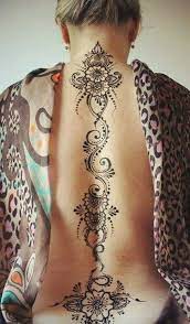 Henna flowers tattoo on back neck. 90 Stunning Henna Tattoo Designs To Feed Your Temporary Tattoo Fix