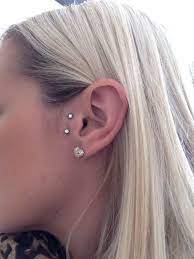 27 Surface Ear Piercing Pictures Ear Piercings Tragus Tragus Piercings Piercings Unique