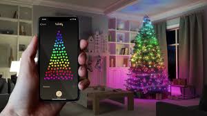 Located at the base of the tree is a control box where a button can be pushed to cycle through eight different light functions including steady on, flashing and fading variations. Twinkly App Controlled Smart Christmas Lights Christmas Designers Youtube