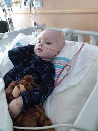 My godson just recently got operated for brain cancer(Medulloblastoma) what a little warrior! [OC] : r/pics