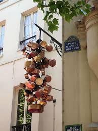 Grape Like Configuration Of Copper Pots Place St Andre Des Arts Paris Storefront Signs Shop Signs Copper Pots