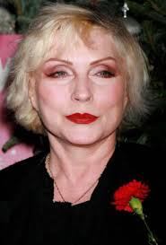 I don't know her name, but I absolutely love her beautiful voice. She's  from the UK. She left in her little lyric mess up, which I love, and I sang  flat on