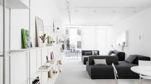 The guest room in the manhattan apartment of architect steven harris and interior designer lucien rees roberts is painted in benjamin moore's classic gray and features a wall of artworks. Modern Minimalist Apartment Interior Design With White And Gray Color Scheme Roohome