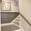 It's a straight horizontal strip running across a room that divides the wall into an upper and lower half. 1