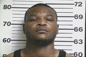 Gulfport man charged with burglarizing motel room
