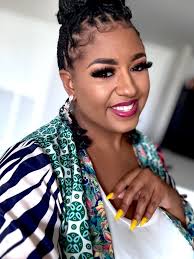 HoliSlay with the beautiful and photogenic Ms. Maxine Norman I did a few  weeks ago. A black Smokey eye, with a touch of gold in the inner corner,  and a shiny red