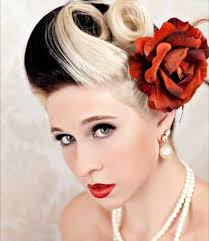 Victory rolls and adding a flower always gives a modern pinup touch