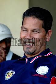 Former West Indian cricketer Larry Gomes, coach of the US under-19 cricket  team, caught in...