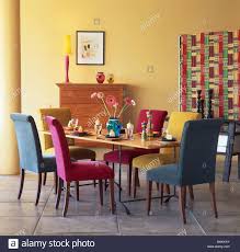 Dining Room Multicolored Chairs Pink Turquoise And Blue Velour Upholstered Dining Chairs Dining Room Colors Round Dining Room Sets Colored Dining Chairs