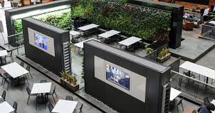 That's great, but for those of us who consistently kill house plants without even trying, keeping an entire feature wall of ferns alive feels daunting. Dirtt Breathe Walls Creative Office Pavilion