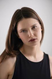 An easy shoot! Sometimes you just happen upon circumstances that make a  photograph. This model had great hair and eyes, but i wanted something  different. So, using 2 flash guns 1 with