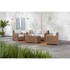 Hampton Bay Laguna Point 4 Piece Natural Tan Wicker Outdoor Patio Conversation Seating Set With Cushionguard Chalk White Cushions H189 01396100 The Home Depot Patio Sectional Outdoor Furniture Sets Conversation Set Patio