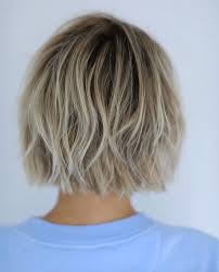 The fine smooth hair lies neatly along the sides of the face. Messy Styled Chopped Bob By Anh Co Tran Haircuts Hair Styles Choppy Bob Hairstyles Medium Hair Styles