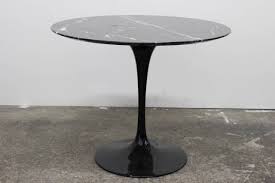 Saarinen went on to design many of knoll's most recognizable pieces, including the tulip chairs and tables, the womb chair, and the 70 series of seating. Black Marble Tulip Table By Saarinen At 1stdibs