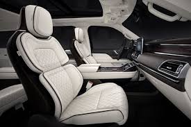 The Striking White Interior Color And Contrasting Dark Piping Of The Chalet Theme Are Shown In This Image Luxury Suv Lincoln Motor Company Suv