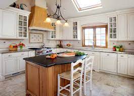 Gorgeous, white wood hood island. Can You Have Stained Trim With White Painted Cabinets Normandy Remodeling