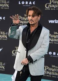 Jack sparrow in the pirates of the caribbean series. Johnny Depp Brings The Odd To Pirates Hollywood Premiere