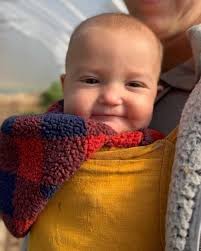 Braelyn loves helping pick all of...