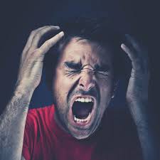 Person pausing to take a deep breath and stay calm, representing anger management therapy Malaysia